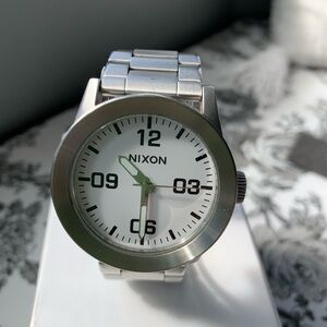 Nixon Silver Watch with White Dial and Black Accents
